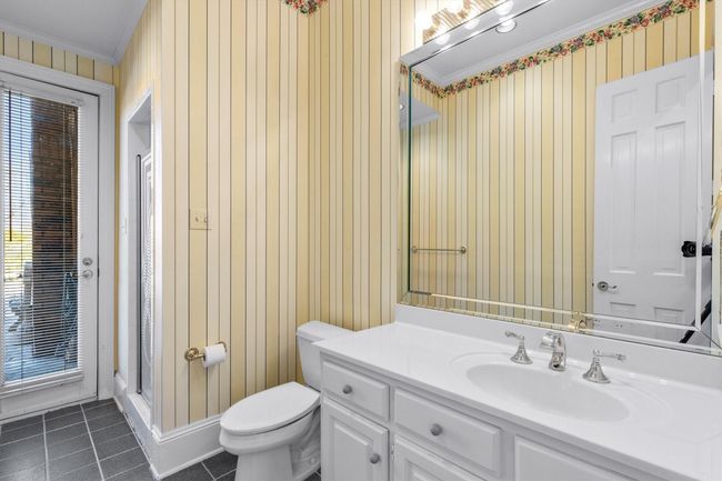 Cabana Bath with its own separate door to the pool and a shower for quick rinse off after a dip in the pool. | Image 40