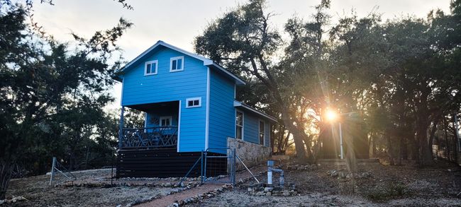 Also included is a separate tiny home with covered porch. | Image 23