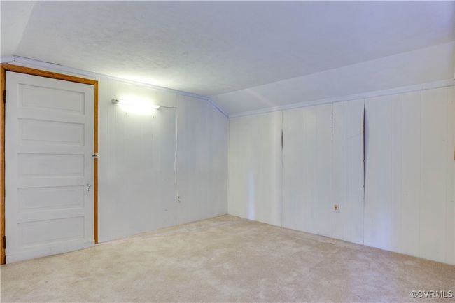 Bonus room with vaulted ceiling and carpet floors | Image 36