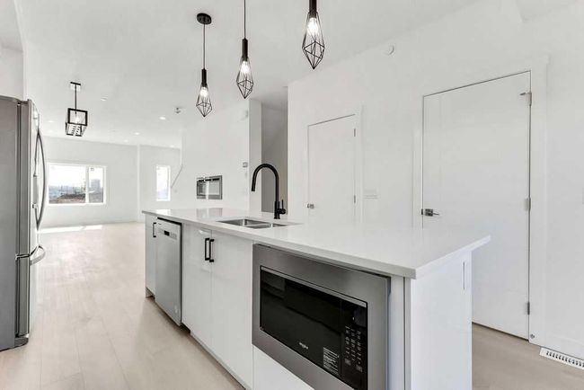 322 Sage Hill Circle Nw, Townhouse with 4 bedrooms, 5 bathrooms and 3 parking in Calgary AB | Image 7