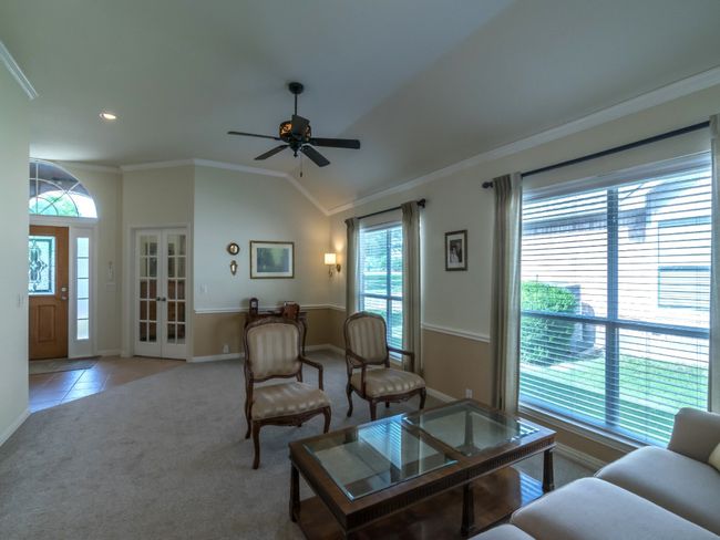 Combination Living/Dining area is very light and bright. | Image 7