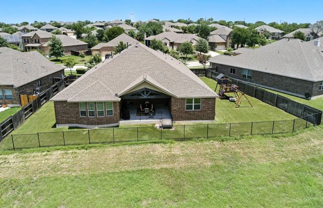 View of front facade featuring brick siding, a residential view, and a playground | Image 38