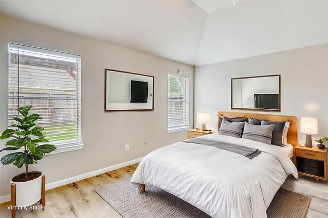 This picture shows the virtually enhanced master bedroom. | Image 20