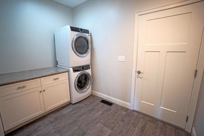 Spacious Mudroom and Laundry off of garage entrance to home. Washer and dryer does not stay | Image 8