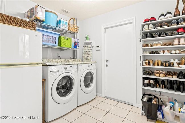 The Laundry Room with Secondary Refrigerator | Image 49