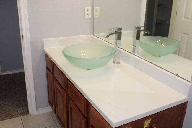 Bathroom with tile patterned floors and vanity | Image 10