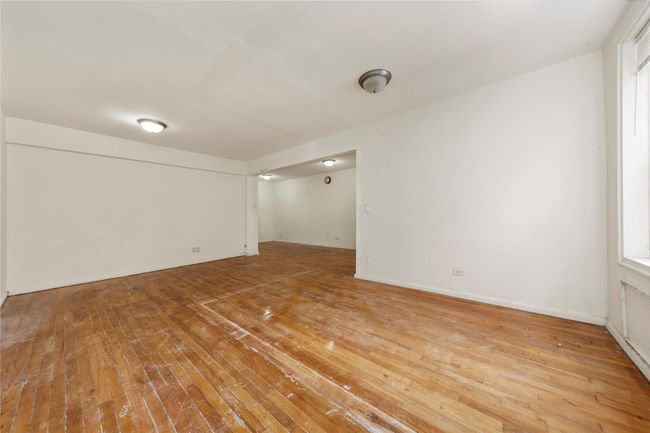 Unfurnished room with hardwood / wood-style floors | Image 5