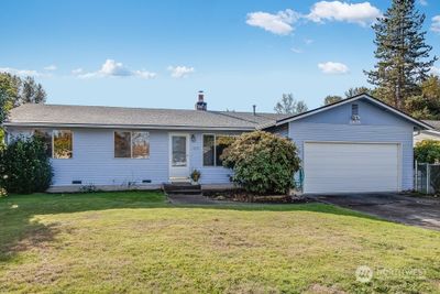 This lucky home has had only 2 owners since built in 1976. It was featured as a model home when the neighborhood was originally developed so it got special treatment with generously sized rooms and the bonus of the family room off the kitchen. Everything is easy here, straight-forward spaces on a level lot holding the opportunity of creating impressive outdoor living areas and/or easy maintenance of status quo. A large variety of groceries, Trader Joe’s, McLendon Hardware, Big Box & necessities are within short 1-2mile hops, tons of international dining & entertainment all within easy 4mile drives, including Kent Station, Carpinito Bros. Farm and Garden Center, and the seasonal Kent Farmer’s Market in Olde Towne. Most commute routes or Transit Center are 1-3miles. For nature therapy, there is a full menu of choices, Soos Creek Trail & Clark Lake Park are closest. This is an ultra-affordable new launch or soft landing! | Image 1