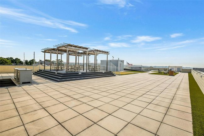 View of home's community featuring a pergola and a patio | Image 27