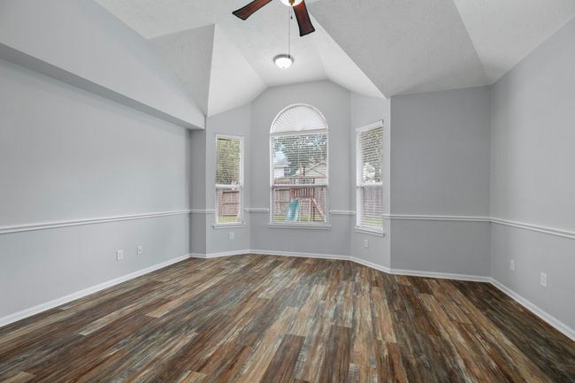 A final look at the primary bedroom reveals the bay window—framing backyard views and adding extra space for a reading nook or seating area. | Image 23