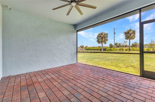 Unfurnished sunroom with ceiling fan | Image 42
