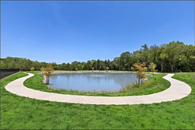 View of community featuring a water view and a yard | Image 4