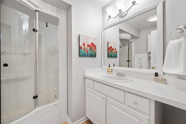 The deep closet has an abundance of storage space. | Image 31