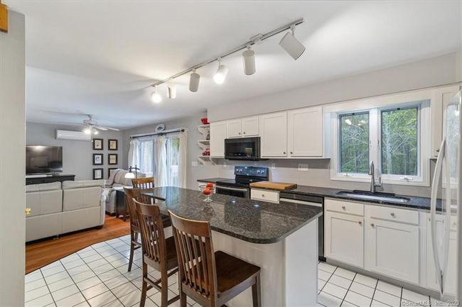 Updated Kitchen with granite, new stove, dishwaher &amp; microwave | Image 5