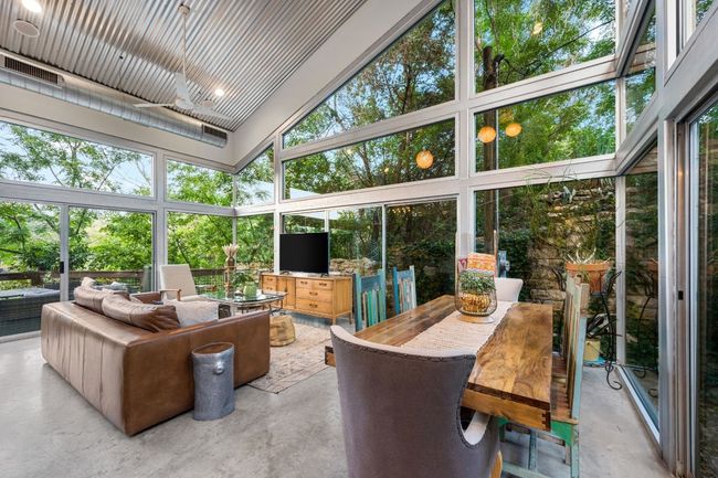 Sealed concrete flooring and an open floor plan. | Image 16