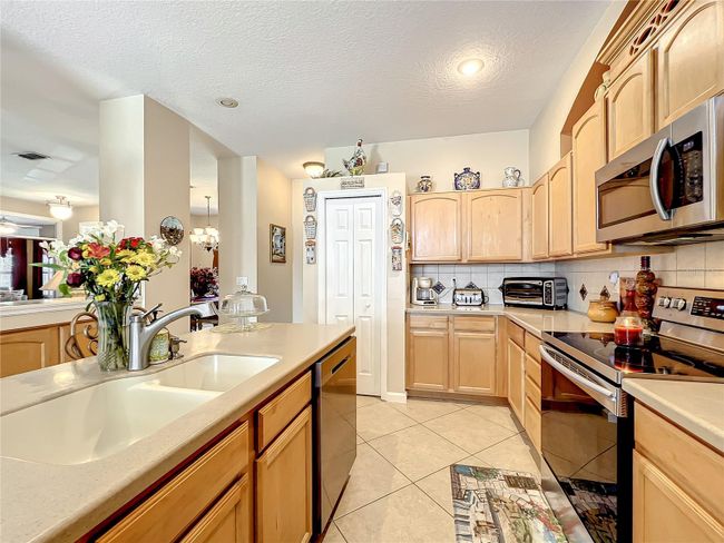 13333 Via Roma Cir, House other with 3 bedrooms, 2 bathrooms and null parking in CLERMONT FL | Image 34