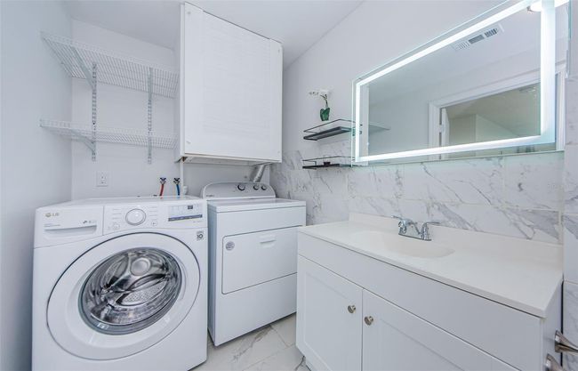 Conveniently Located Washer and Dryer Included | Image 22
