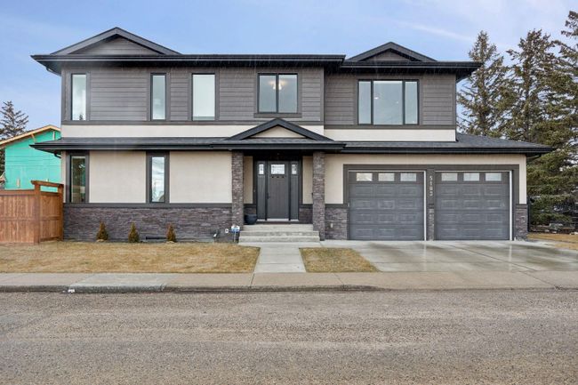 5103 18 Avenue Nw, Home with 5 bedrooms, 3 bathrooms and 4 parking in Calgary AB | Image 2