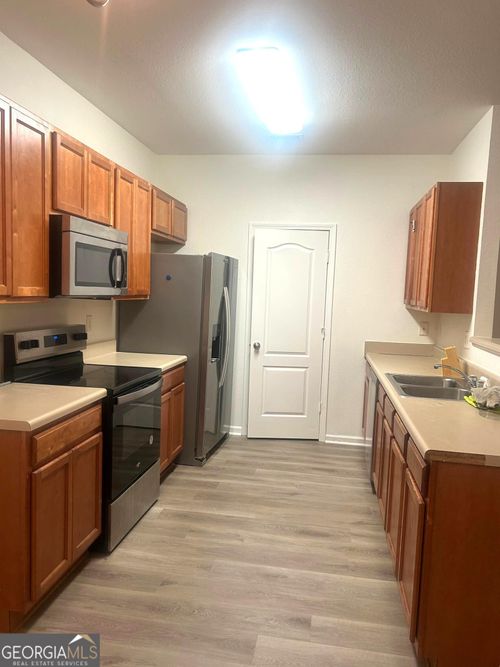 1253 Chinon Pt, Lithonia, GA, 30058-7058 | Card Image