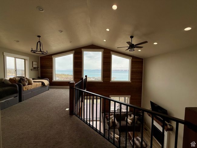 Corridor featuring recessed lighting, carpet floors, vaulted ceiling, and an upstairs landing | Image 31