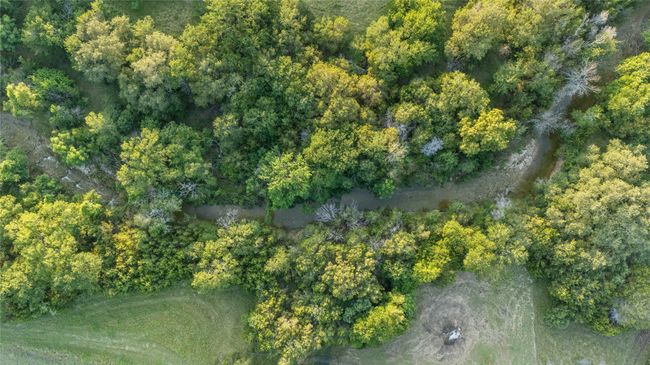 Aerial overview of property's location with a forest | Image 29