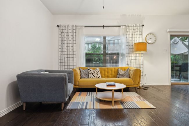 Living area with baseboards and hardwood / wood-style flooring | Image 4