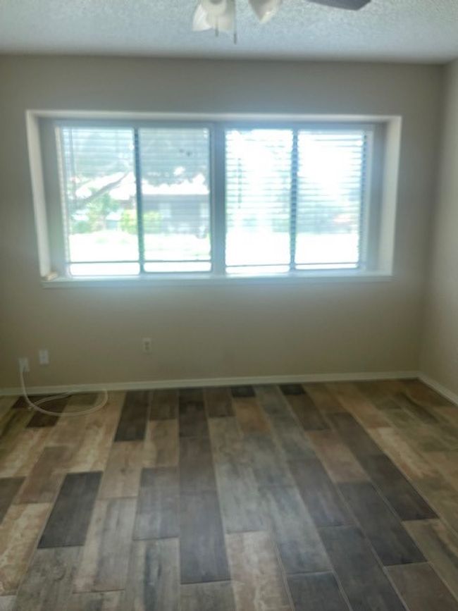 LVP floors in most rooms and ceramic tile in kitchen and baths | Image 20