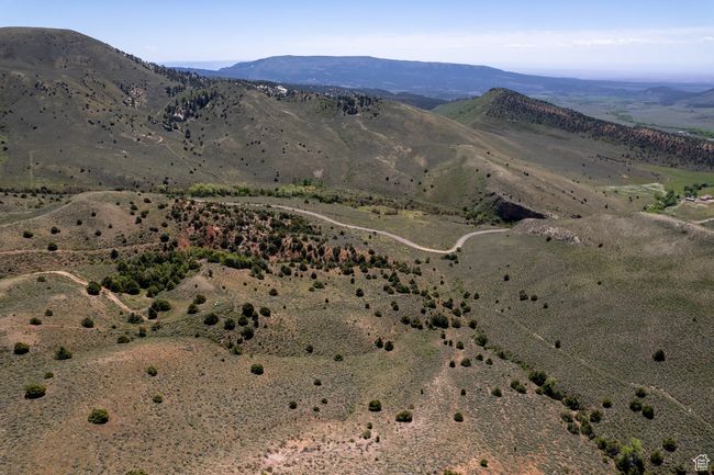 Mountain view featuring a desert landscape and rural landscape | Image 6
