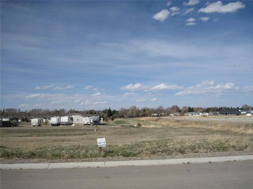 610 Whispering Greens Ave, Vulcan, AB, T0L2B0 | Card Image