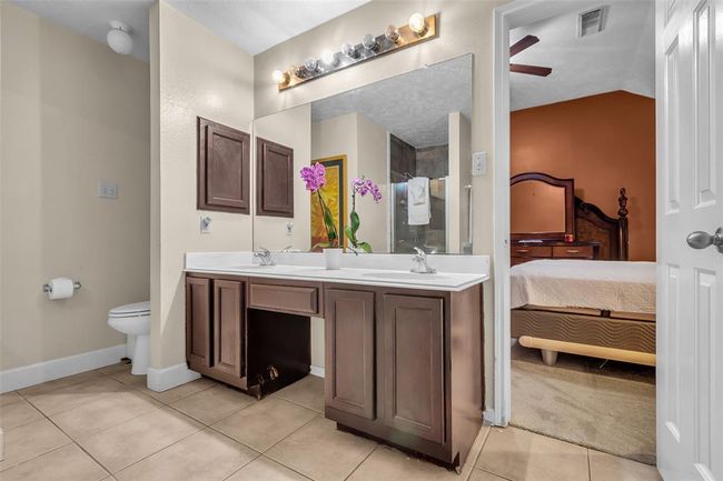 Primary bathroom with double sinks, a garden tub and separate shower. | Image 30