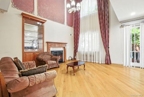 77 Kew Forest Ln, Forest Hills, NY, 11375-7051 | Card Image