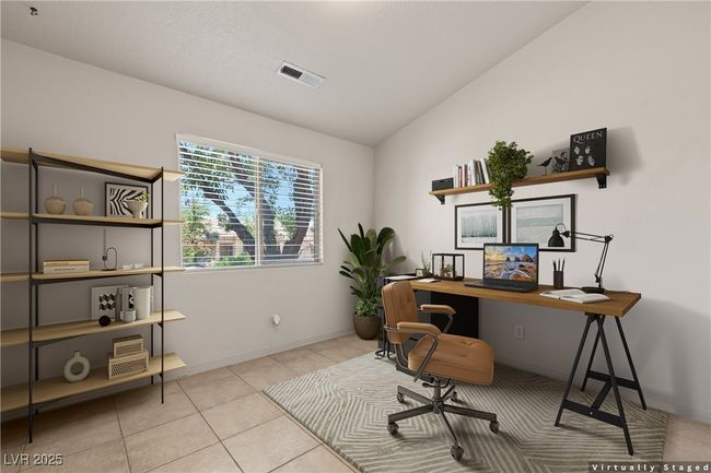 Office area with vaulted ceiling and tile patterned floors | Image 33
