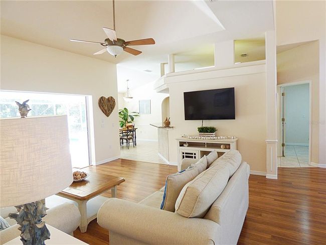 from the great room, go to the dinette, the kitchen or the guest side area | Image 12