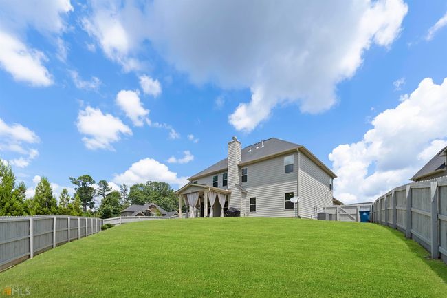 3015 Button Cir, House other with 4 bedrooms, 3 bathrooms and null parking in Loganville GA | Image 5