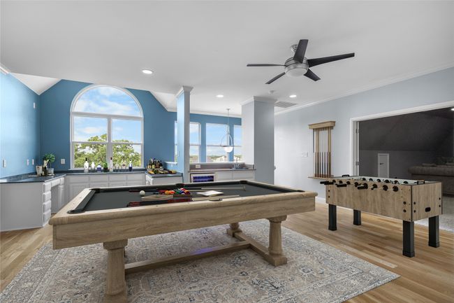 Spacious upstairs game room designed for both fun and function! | Image 21