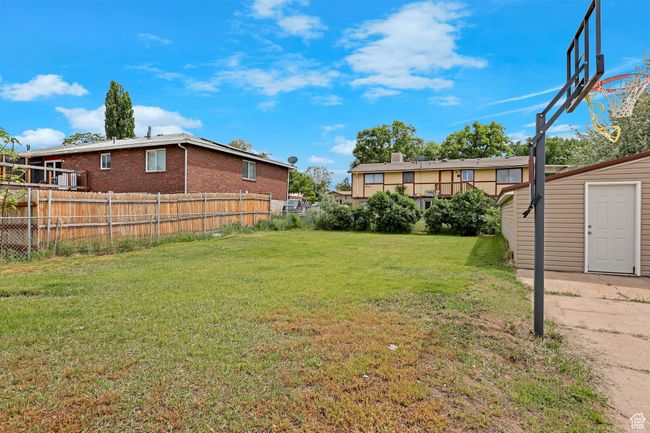 View of yard with an outdoor structure | Image 30