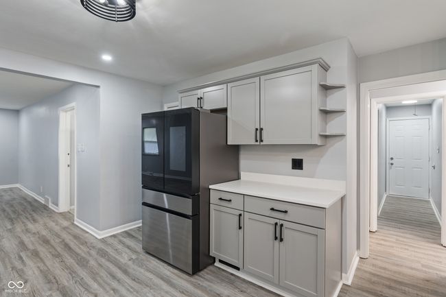 kitchen featuring gray cabinetry, open shelves, baseboards, and recessed lighting | Image 14