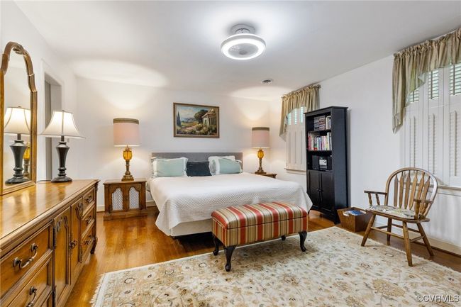 Bedroom featuring light wood-type flooring and baseboards | Image 37