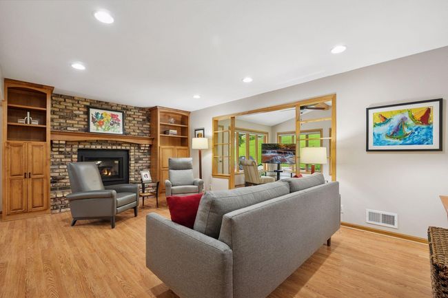Beautiful gas fireplace, hardwood floors & 6 panel doors on main the level | Image 5