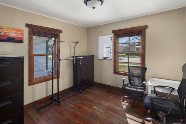 Office featuring ornamental molding and dark wood-style floors | Image 17