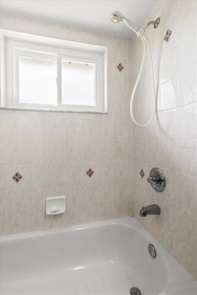 Bathroom 2... Tiled Shower/Tub Combo w/ Handheld Shower Head | Image 34