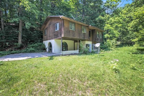 5457 N Manitou Trl W, Leland, MI, 49654-9713 | Card Image
