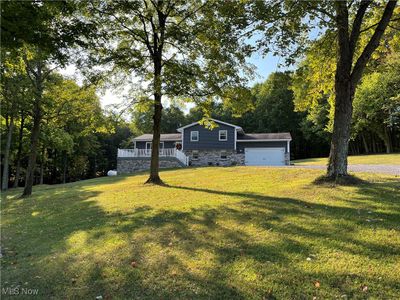 View of yard with a garage | Image 1