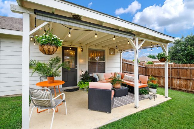 View of patio / terrace featuring an outdoor living space and beverage cooler | Image 23