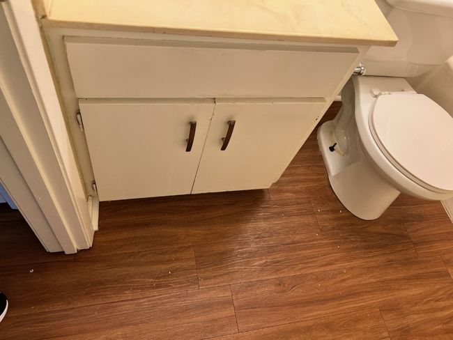 Half bath featuring toilet and wood finished floors | Image 24