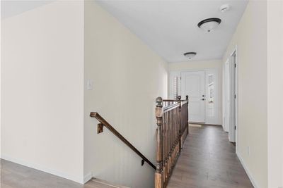 Corridor featuring hardwood / wood-style floors | Image 2