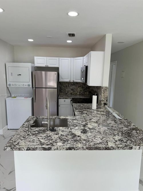 1050 Nw 25th Way, Fort Lauderdale, FL, 33311-5711 | Card Image