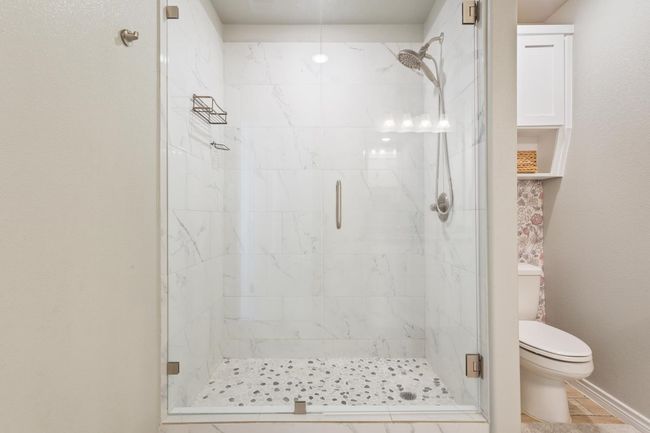 Bathroom featuring a stall shower | Image 21