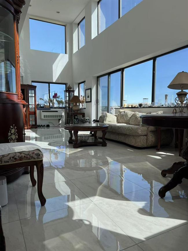 Community lobby featuring a high ceiling | Image 4