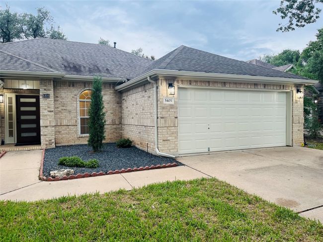 Front Entry features New front door and light fixture. | Image 24